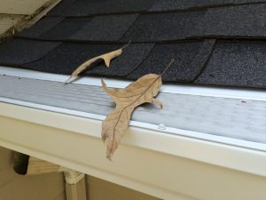 microscreen u.s. gutter guard installed on new 6 inch gutters