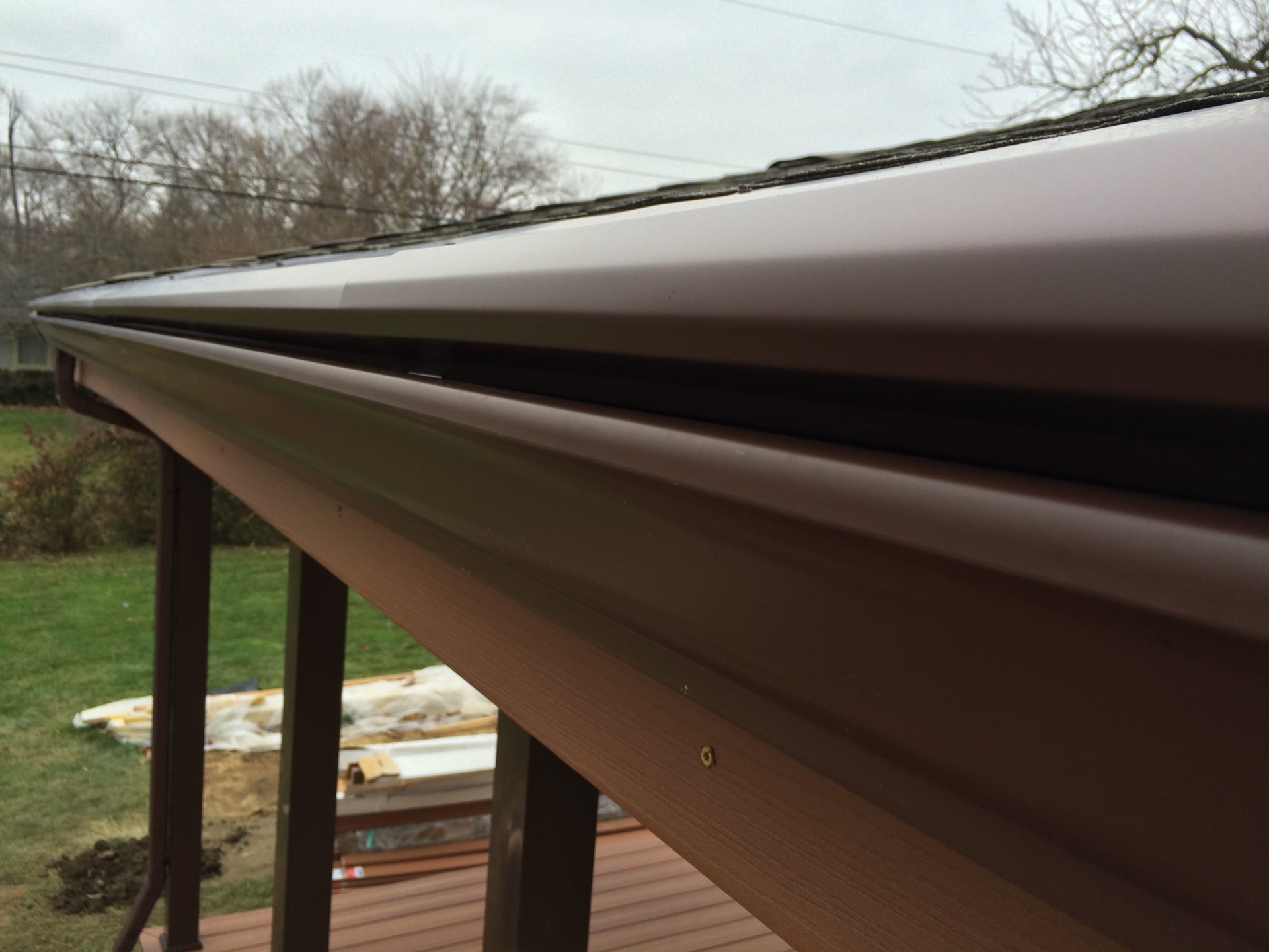 gutterlock gutter guard installed on 5 inch brown gutters in columbus ohio