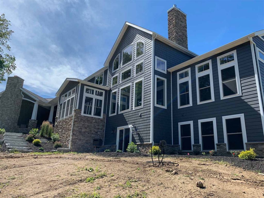 rear of large new home with undersized 5-inch gutters in Columbus ohio