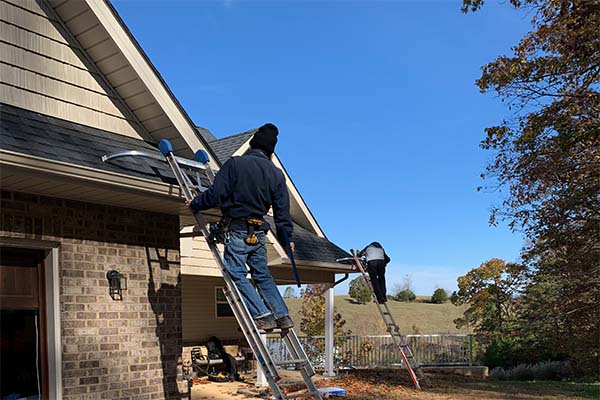 gutter guards direct crew installing gutter guards on a home in tennessee