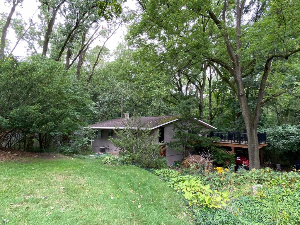 6-inch gutters and MasterShield gutter guards installed on a walkout ranch home in Ann Arbor, Michigan