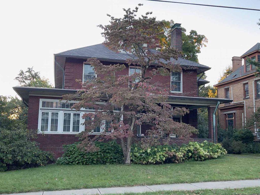 6-inch dark bronze gutters tied into copper downspouts + mastershield gutter guards in Pittsburgh, PA