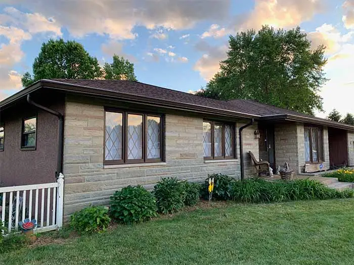 ranch home with 6-inch musket brown gutters and Mastershield gutter guards
